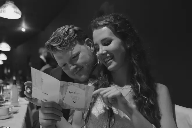 Reading the wedding card